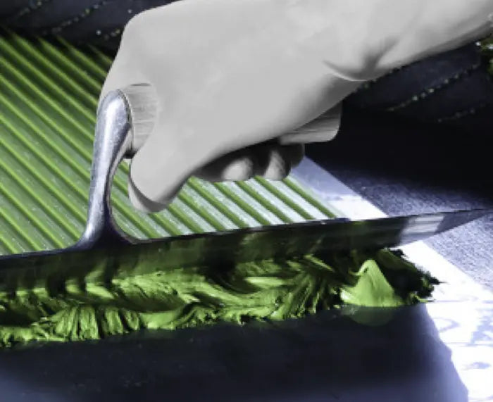 Mapei Ultrabond Turf PU 1K being applied by trowel