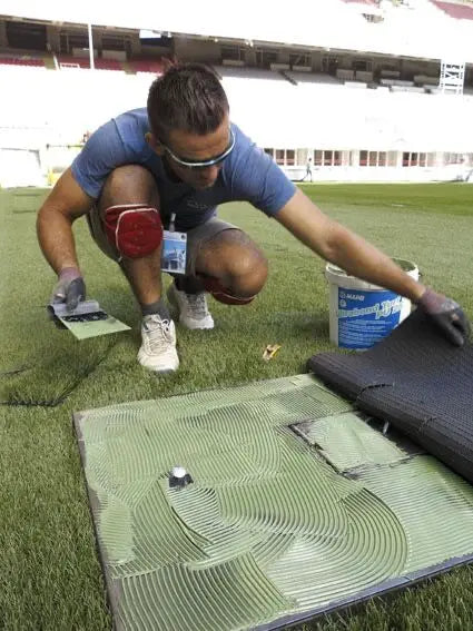 Mapei Ultrabond Turf PU 1K being installed at San Siro Stadium Italy